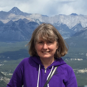 Sharon Keast with mountains in the far-off background.