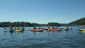 People in cayaks in a river